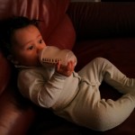 Relaxing with a bottle of formula.